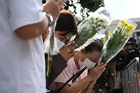Woman dies week after Bangkok bar fire, raising toll to 34