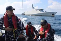Rescuers in Indonesia find mother and son survivors from sunken passenger boat