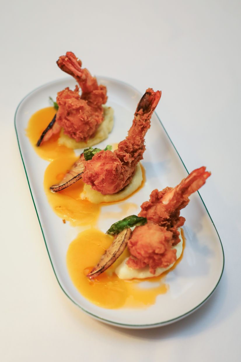 Crispy prawns are the star of this aquatic appetiser.