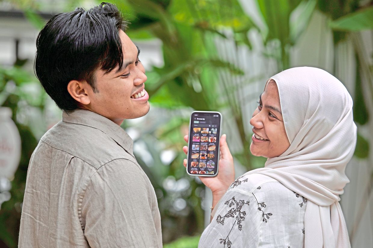 In the process of developing his app, Hafizuddin Sharif incorporated feedback from his wife Nur Iffah and regarded her as the project owner. — LOW LAY PHON/The Star