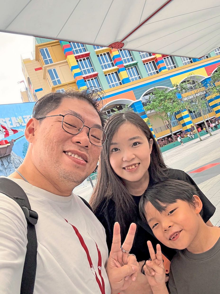 Cheah with his wife Hor and his son, whom he calls HimHim. — CHRISTOPHER CHEAH WEN FENG