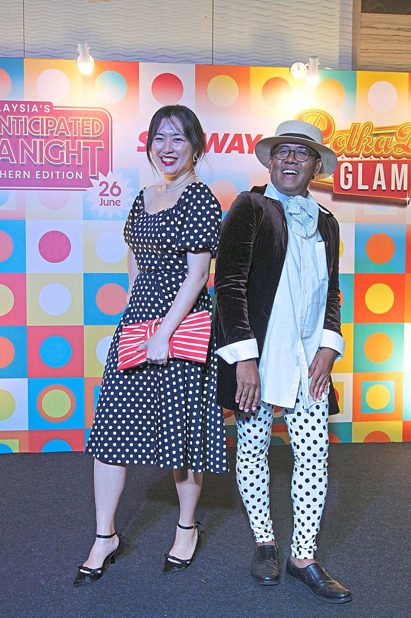 Best-dressed winners Yeoh (left) and Noor Asrolizham.