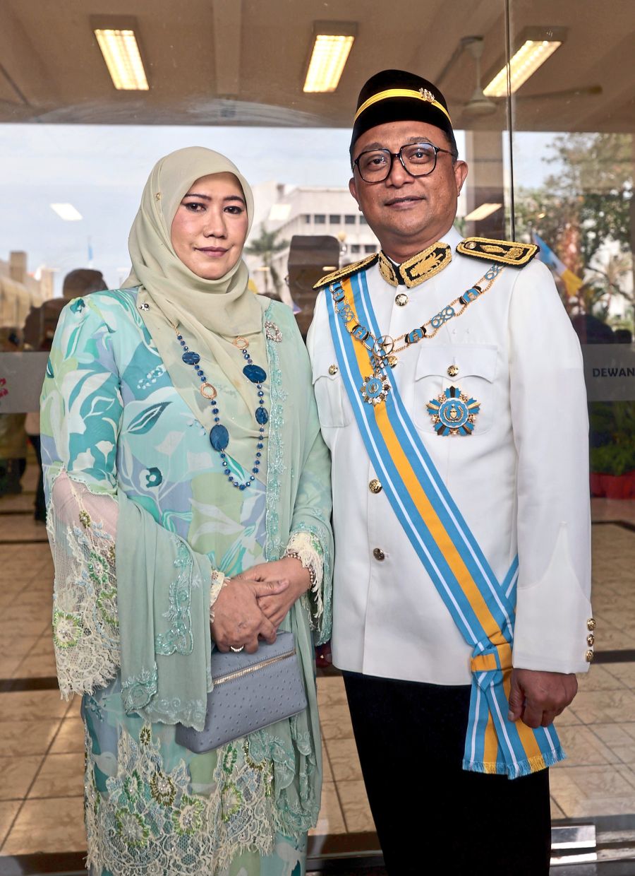 Darjah Gemilang Pangkuan Negeri (DGPN) recipient Zulfikri with wife Datin Seri Munirah Ali.