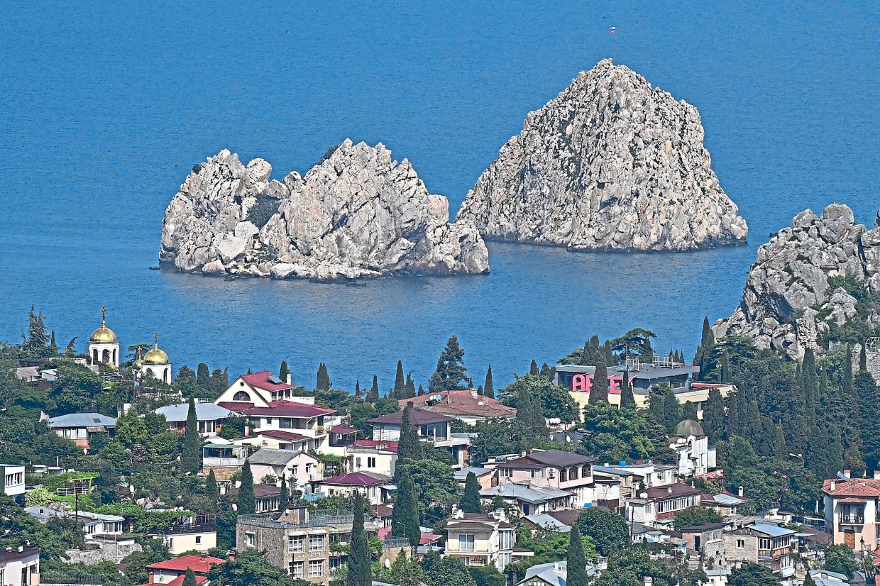 A file picture of Yalta, another major resort city of the Crimean peninsula, where many tourists still visit. — AFP