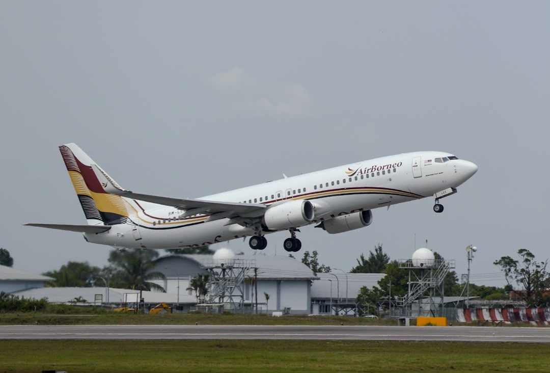 AirBorneo's inaugural Kuching-Kuala flight taking off at Kuching International Airport on Monday (July 20). - ZULAZHAR SHEBLEE/The Star