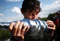 Motor racing-Antonelli hits a new high at scene of last year's low