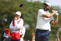 Golf-Scheffler defends Dechambeau after two-stroke penalty row