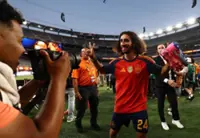 Soccer-It's tattoo time for Spain defender Cucurella says coach De la Fuente