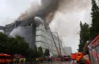 Despite rain, Coupang warehouse in South Korea blaze burns into third day