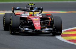 Motor racing-Hamilton cleared of blame after his car knocked over mechanic
