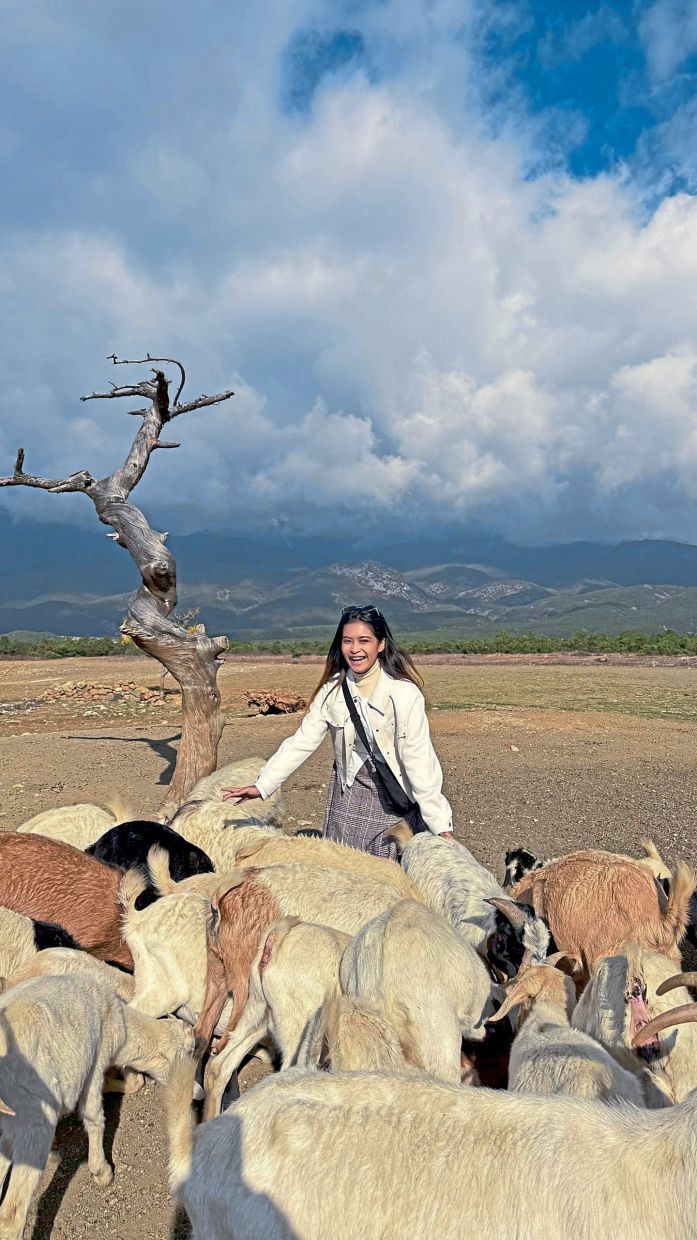 Ummi in Yunnan, China. Before she travels overseas, she will first list things that she needs to look out for at the stores. — UMMI NAJIHAH