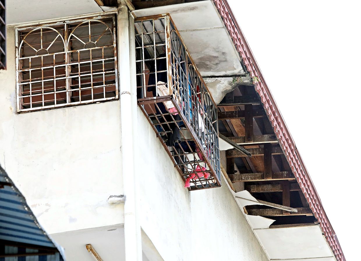 Sections of the roof at Flat Taming Jaya Kiri in Balakong, Selangor, are broken and in urgent need of repair.