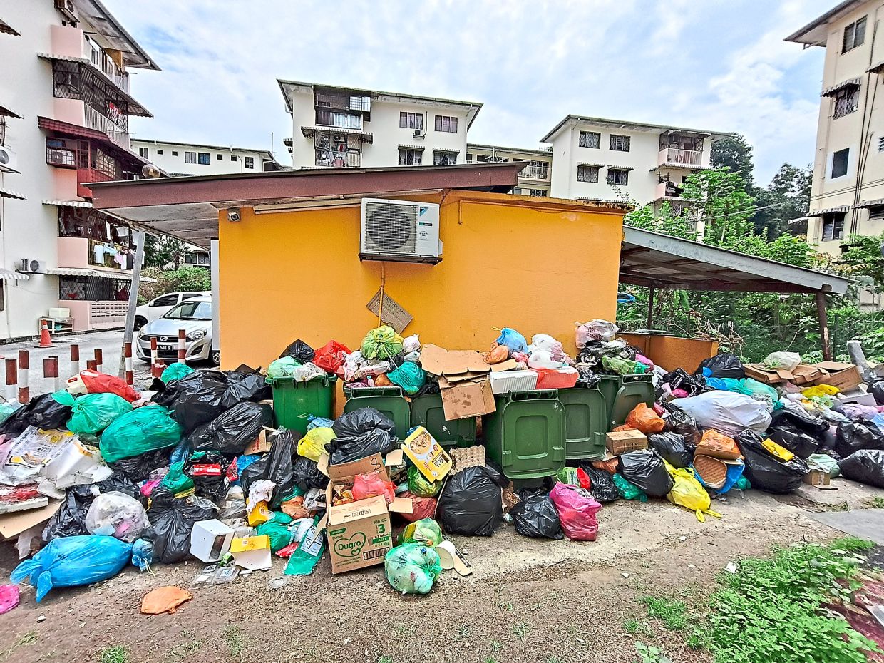 A mounting rubbish pile at Flat Seksyen 2 in Wangsa Maju, Kuala Lumpur, on June 2. Alam Flora cleared the waste the following day after complaints, but residents urge authorities to find a long-term solution to the persistent problem.