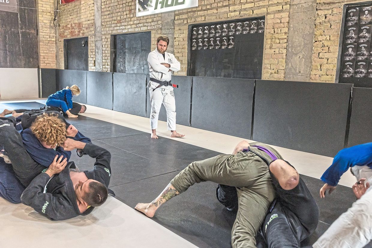 Iskra, a jujitsu coach, training veterans at the TMS Hub gym in Kyiv, on May 30. — Oksana Parafeniuk/The New York Times