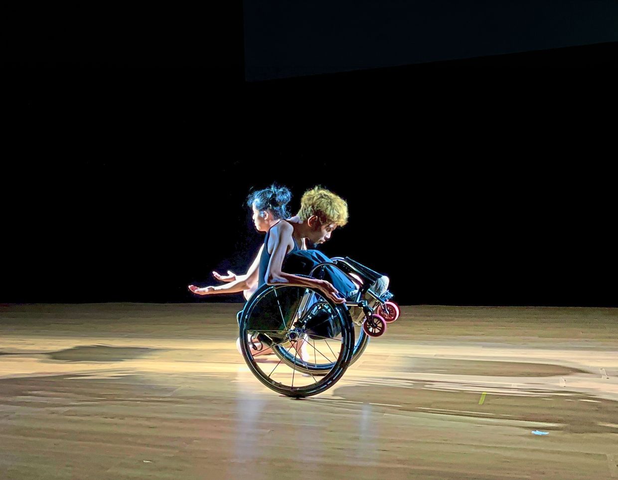 Ho and Wheelsmith (right) star in KLPac’s 'Being Carried', a disabled-led show directed by British playwright O’Reilly. – SENG SOO MENG