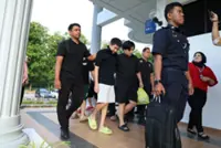Nine Chinese nationals charged with criminal conspiracy linked to love scam