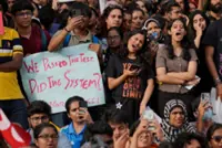 Thousands protest in India after clashes, despite Modi assuring action on exams