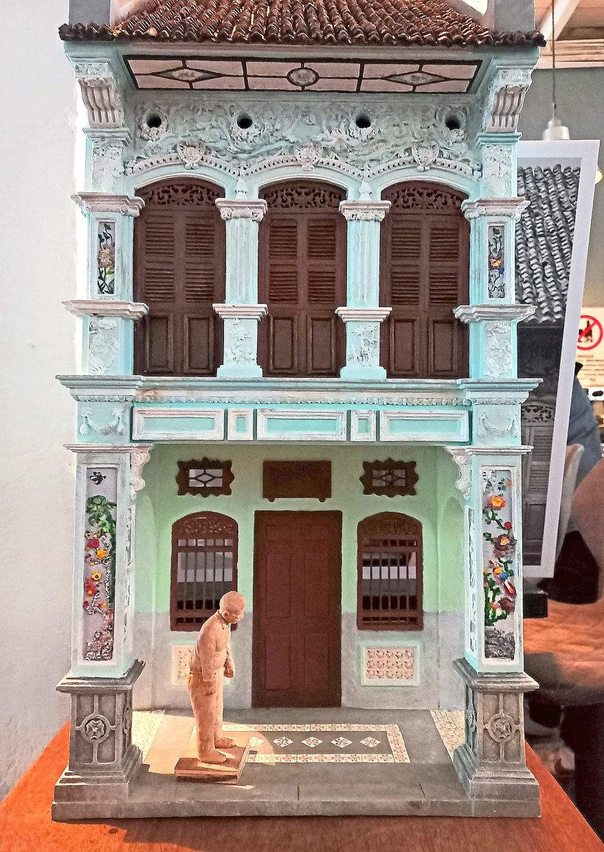 One of Low’s sculptures of a shophouse replica. — JEREMY TAN/The Star