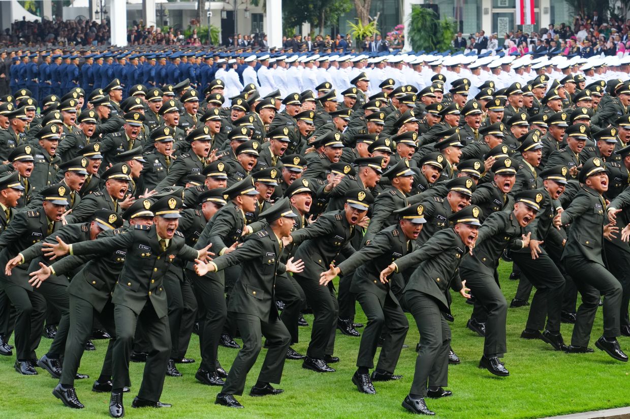 Indonesian Military Academy graduates performing their battle cry during their inauguration ceremony as second lieutenants at Merdeka Palace in Jakarta, Indonesia on July 22, 2026. -AP