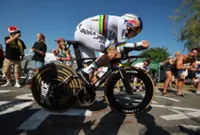 Cycling-Evenepoel wins time trial to cut Pogacar's lead