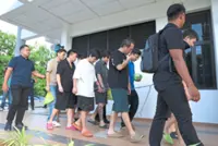 Nine Chinese nationals deny role in love scam