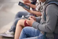 French lawmakers approve a sweeping social media ban for children under 15