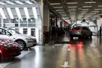 Shanghai holds compliance guidance meeting with automakers including Tesla, BYD