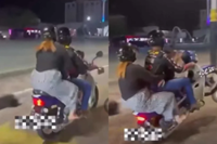 QuickCheck: Did a motorcyclist pop a 'wheelie' while ferrying his wife and child?