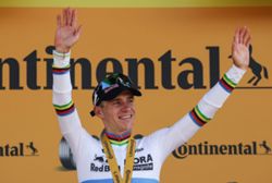 Cycling-Evenepoel admits 'bittersweet' win after teammate Lipowitz crashed