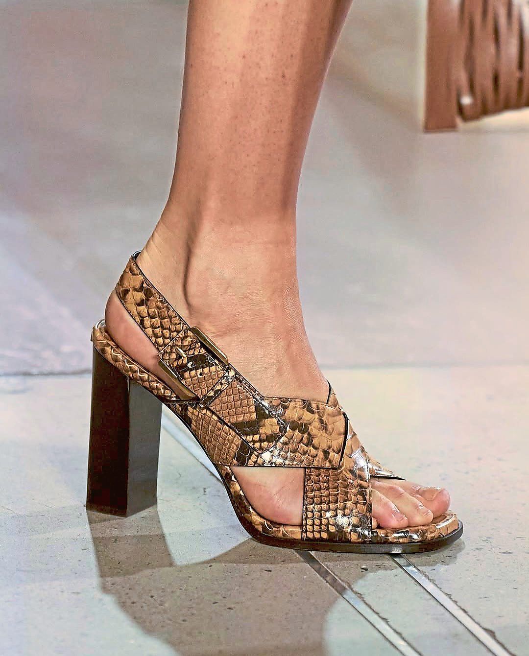 Walk on the wild side in these block-heeled footwear that will make any wardrobe pop with exotic character. Photo: Michael Kors