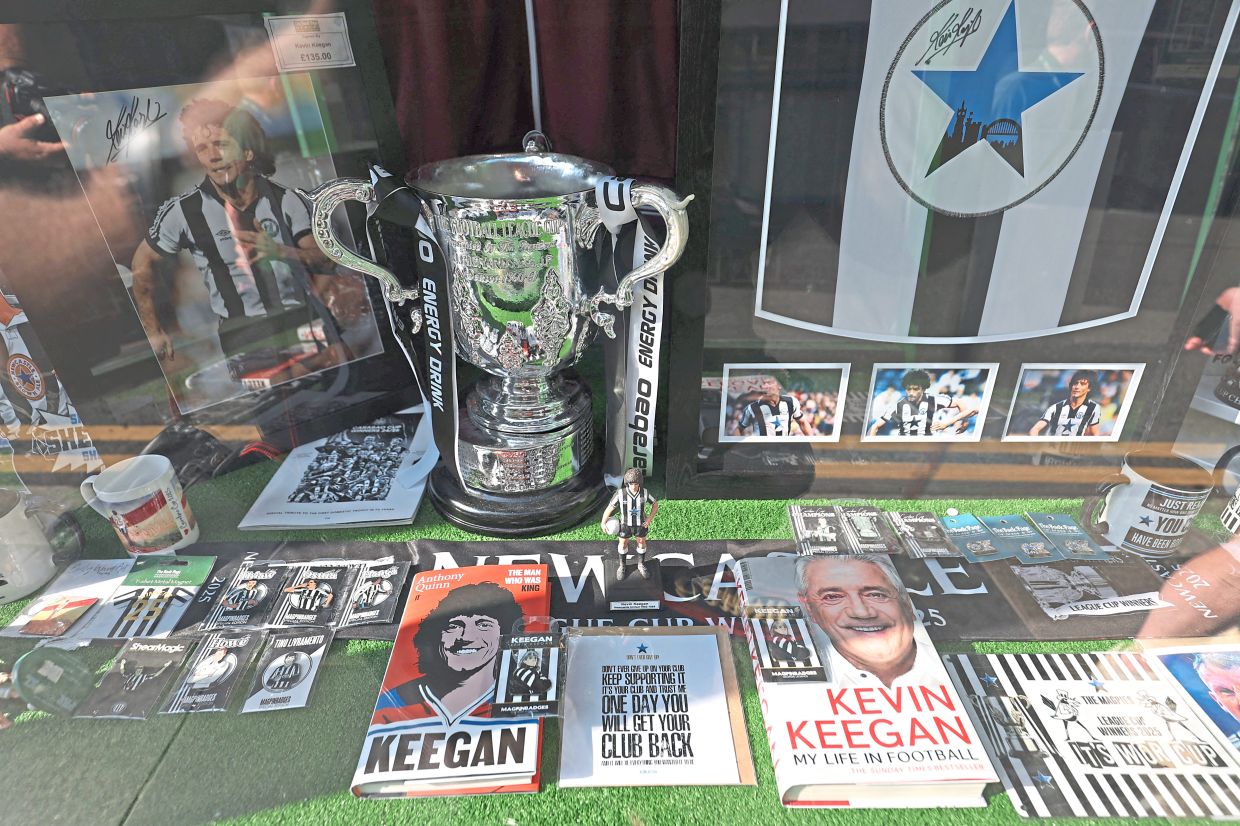 Items of Keegan displayed in The Back Page shop in Newcastle near the stadium.