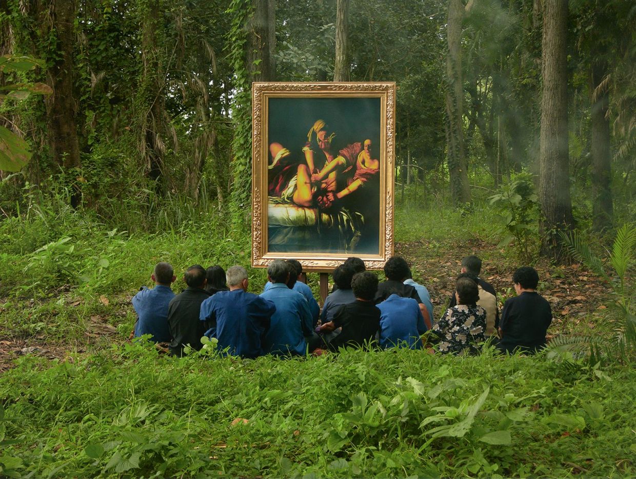 In her series 'Village And Elsewhere', Thai artist Araya places framed reproductions of Western art in public spaces and natural landscapes in Thailand. Photo: Ilham Gallery