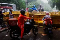 Food, fury and supporters near and far keep India protest alive
