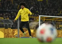 Soccer-Barcelona sign pacy winger Adeyemi from Dortmund
