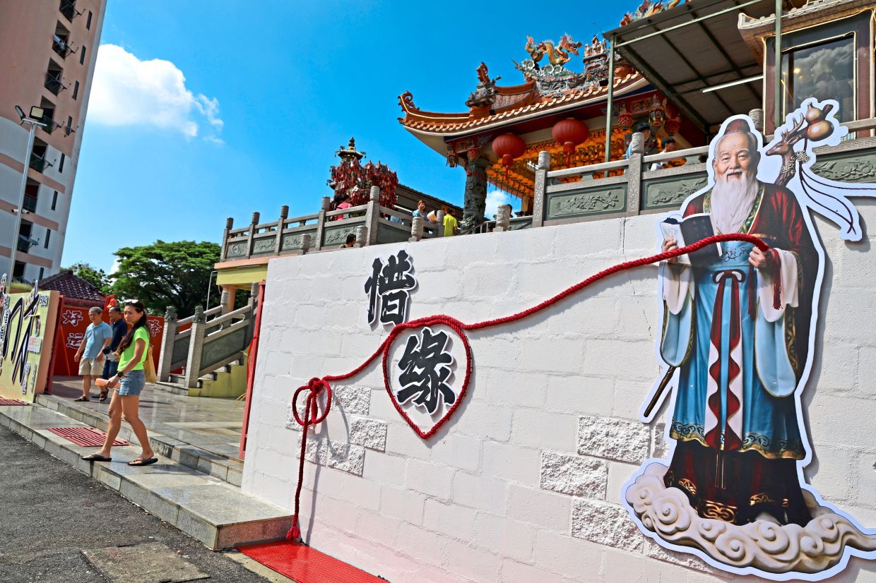 The Matchmaker Destiny Wall featuring Yue Lao, the Chinese deity of marriage and love.