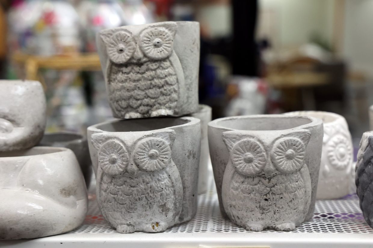 Decorative owl figurines are made from recycled glass.