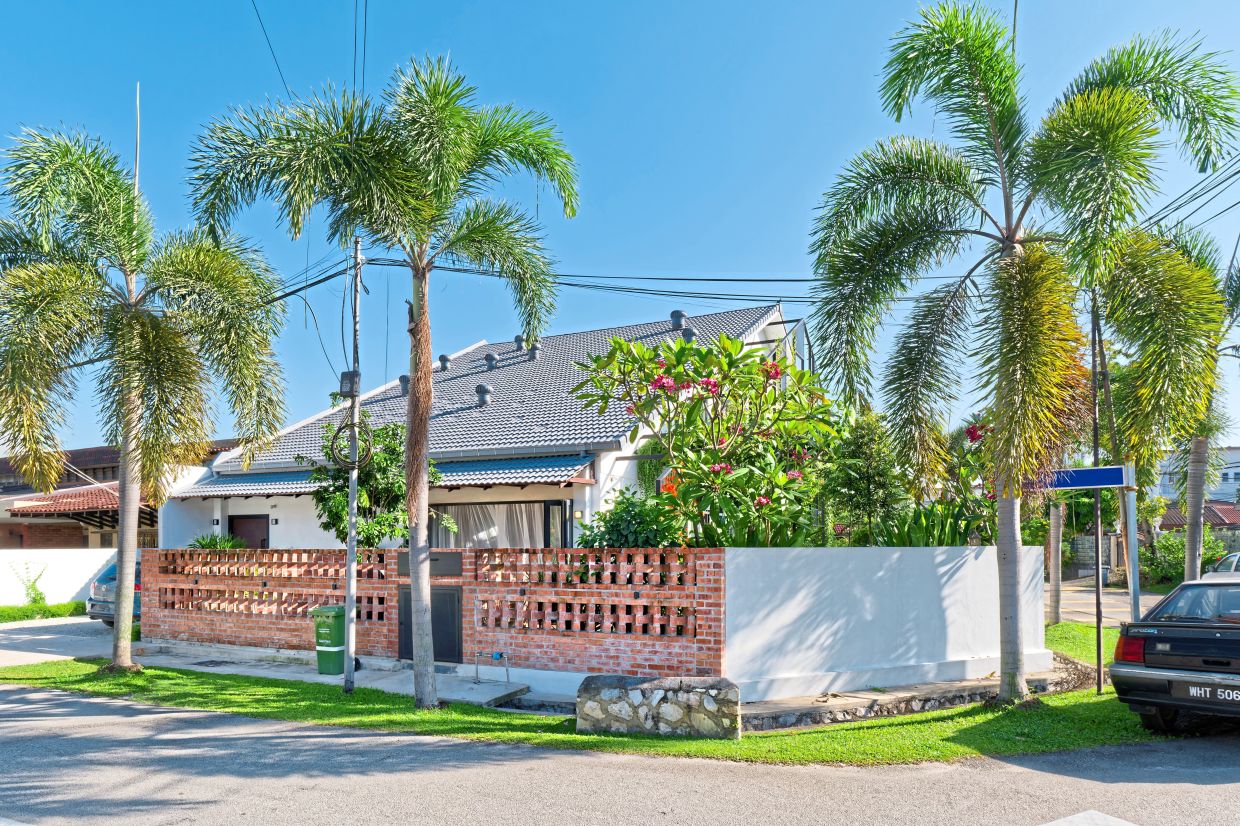 The brick lattice wall at the front adds character to the house.