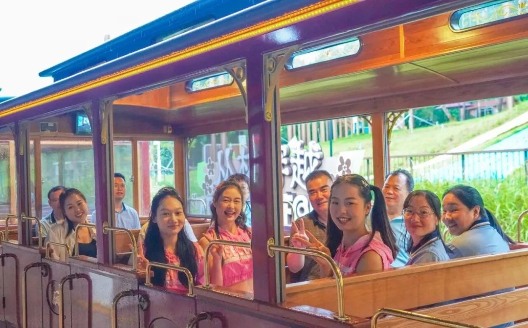 Passengers pose for a photo on the forest train at the OCT East Tea Valley in Shenzhen, Guangdong in this undated photo shared on a WeChat public account of Yantian district government. - Photo: WeChat