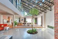 40yo Malaysian terrace house transforms into tropical home infused with light and nature