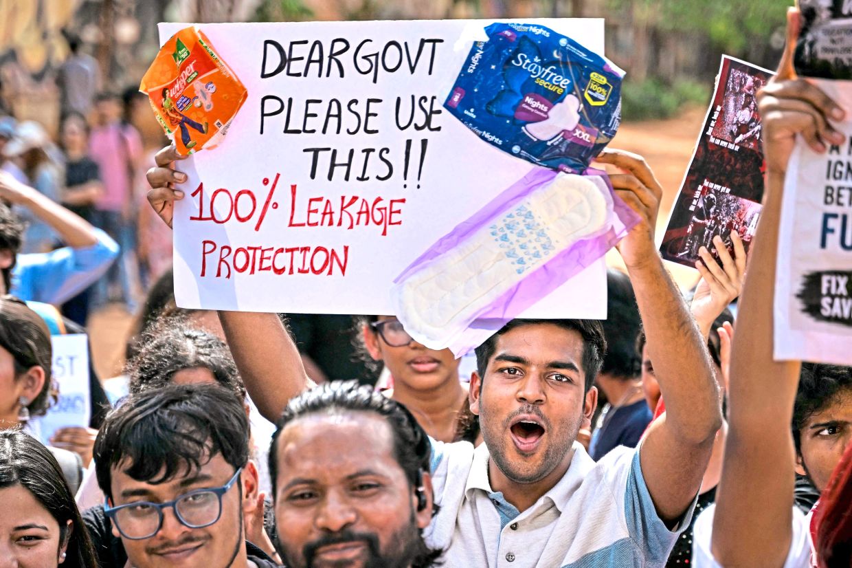 Not backing down: Protesters gather at Bengaluru’s Freedom Park in support of the Jantar Mantar agitation calling for Pradhan to step down. — AFP