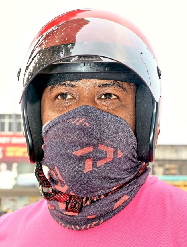 Mohd Hanafiah says the shelter will offer riders like him protection from sun and rain.