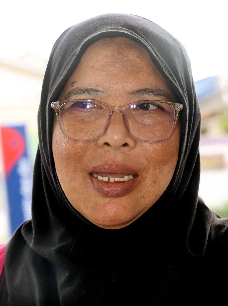 Hasni is grateful for the fuel subsidy as she ferries her four children to and from school.