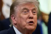 Trump says US and Iran are talking, but Tehran is not yet ready for deal