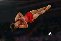 Gymnastics-England gymnast Langton conscious after heavy fall at Commonwealth Games