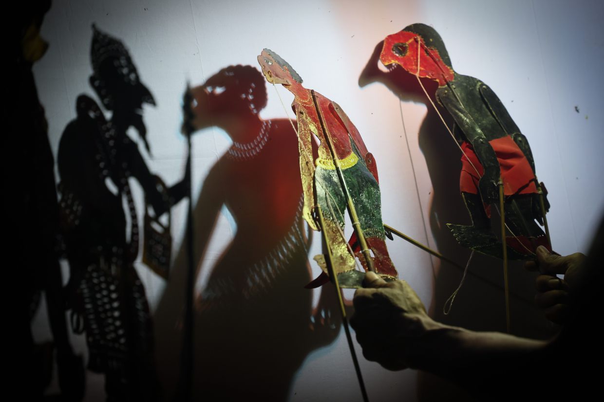 Various character elements and contemporary issues are incorporated into the dialogue to draw audiences from all walks of life to wayang kulit performances at Kampung Kubang Rawa in Kota Baru, Kelantan. Photo: Bernama