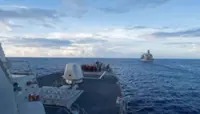 China also holds air and navy patrol in South China Sea 