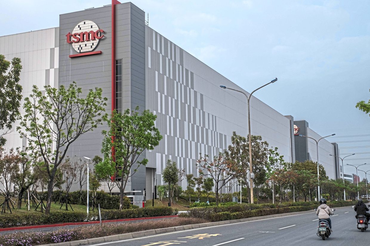 A file photo of a TSMC factory in Tainan, Taiwan. AI demand is driving stock market gains and booming exports in South Korea and Taiwan, but the rest of the economy is being left behind. — Lam Yik Fei/The New York Times
