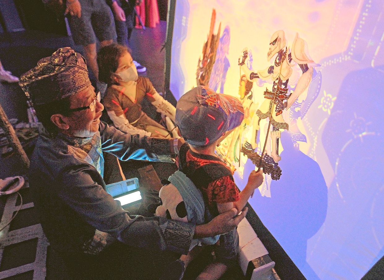 The Nine Arts Festival welcomes audiences of all ages, with Fusion Wayang Kulit offering a fresh approach to experiencing cultural heritage. Photo: The Star/Art Chen