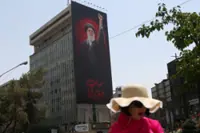 Iran says it will halt strikes as long as US bombing pause holds