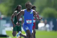 Athletics-Lyles eases injury fears after cramp halts 200m run